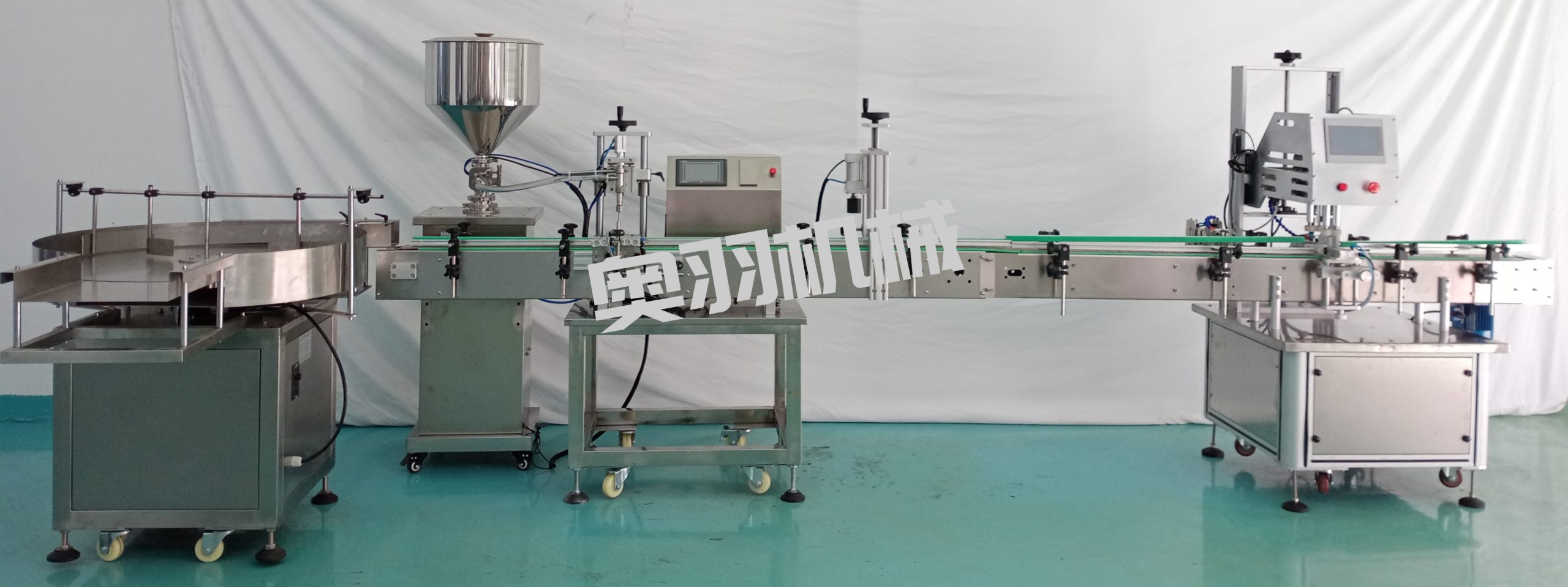 小型液體自動(dòng)灌裝旋蓋流水線_http://www.8sdai.cn_瓶裝灌裝生產(chǎn)線系列_第1張